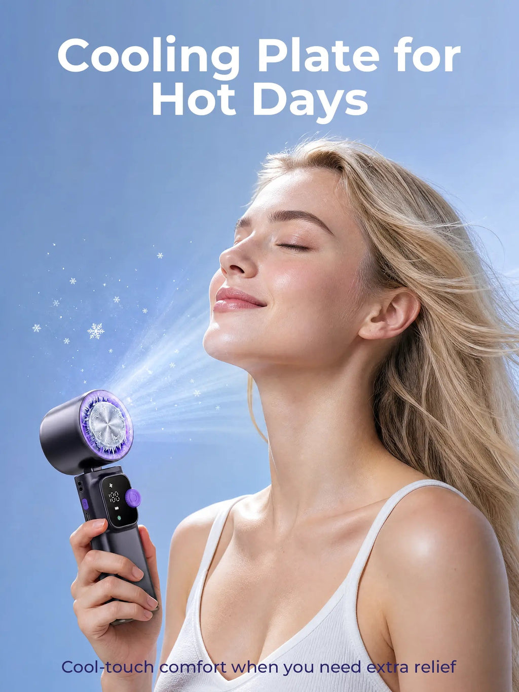 Portable handheld fan in use outdoors